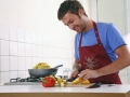 young mann cooks